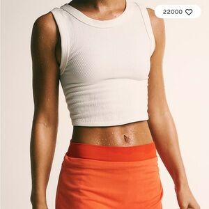 White free throw elbow tank- FREE PEOPLE